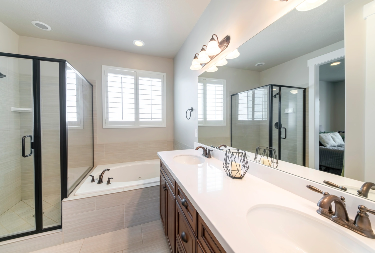 A spacious remodeled bathroom in a Weymouth, MA home with a freestanding tub.